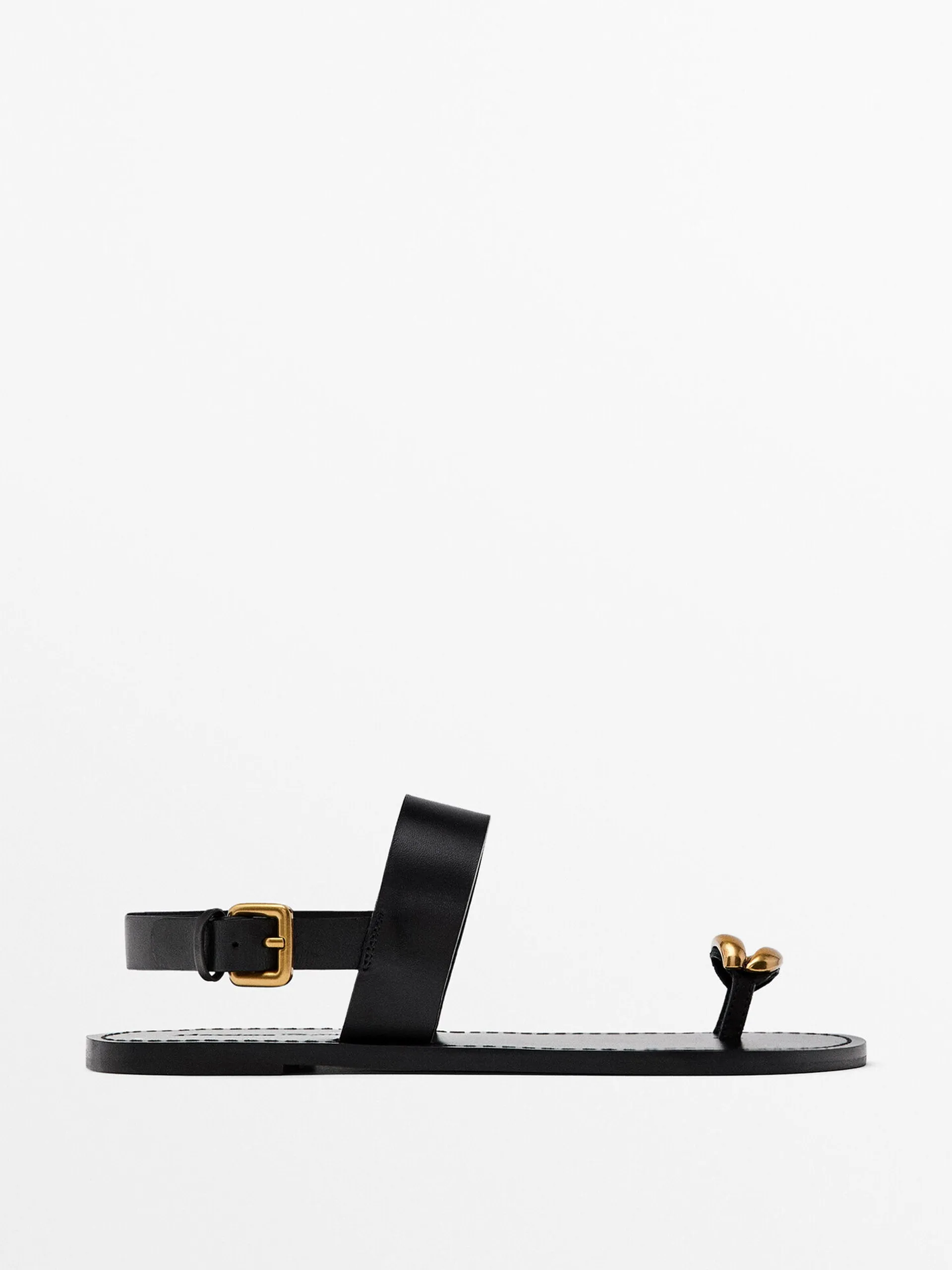 Flat sandals with metallic embellishment