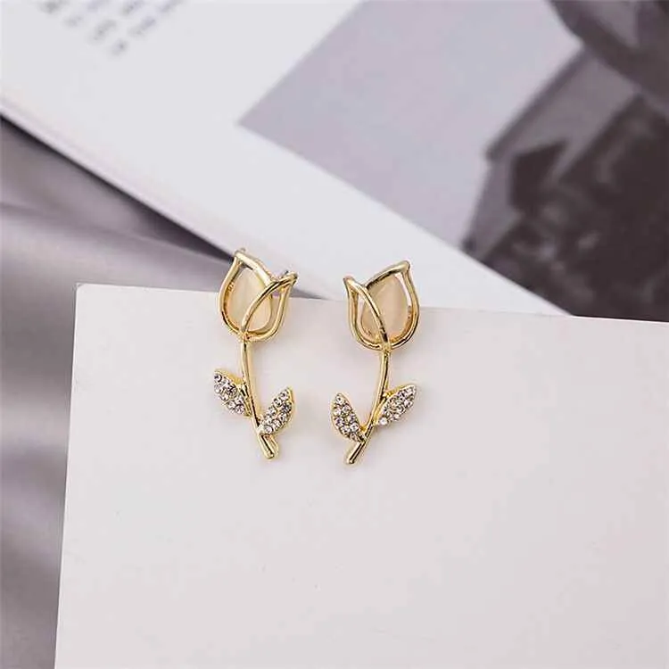 Rendy 18k Gold Plated Marble Finished Flower Shape Stud Earrings with Rhinestone Studded Stem: Stylish and Elegant Jewelry for Any Occasion